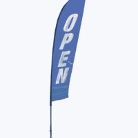 Outdoor flag saying business is open during COVID-19 pandemic
